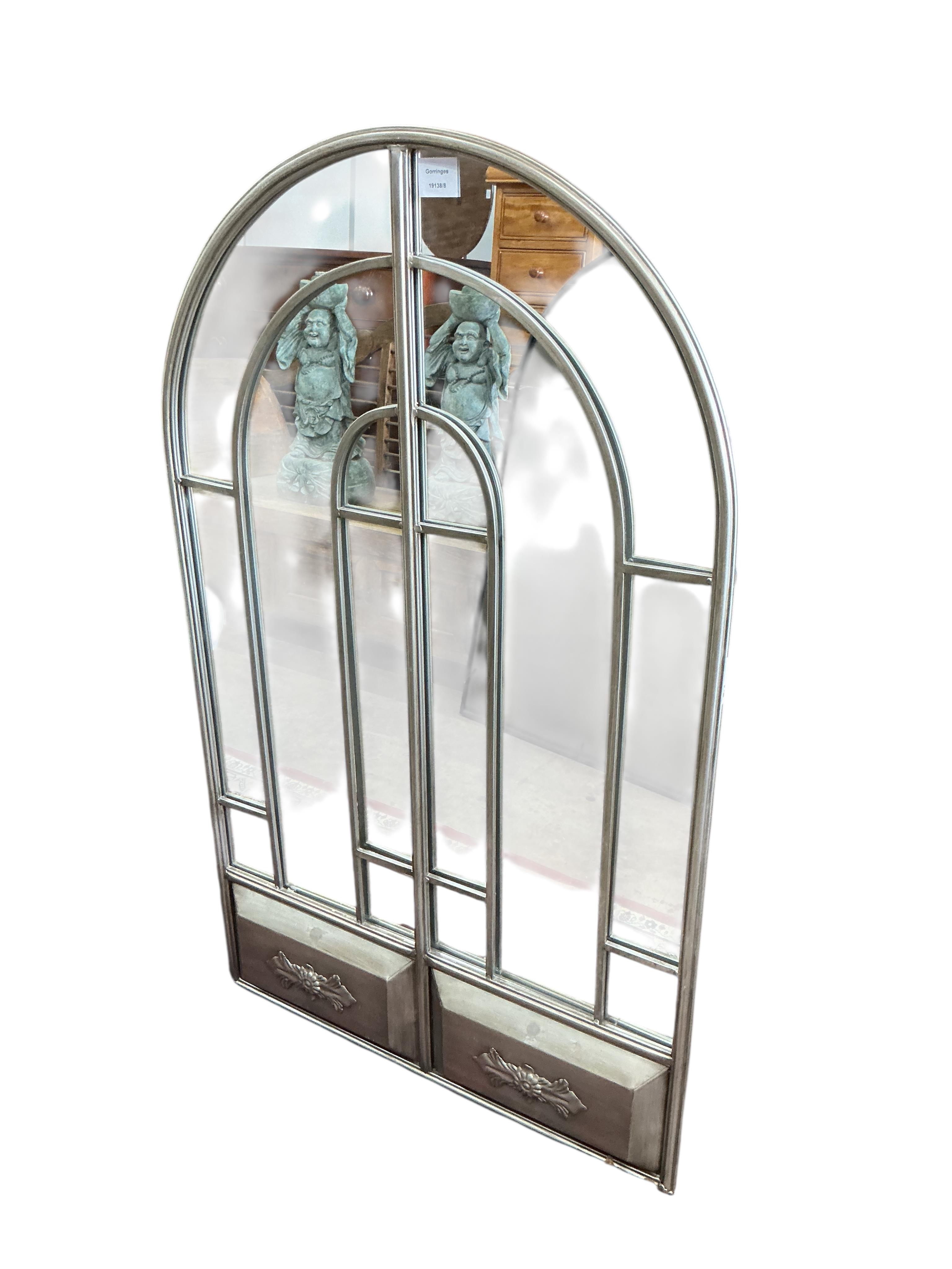 Two metal framed arched window pane wall mirrors, width 68cm, height 111cm